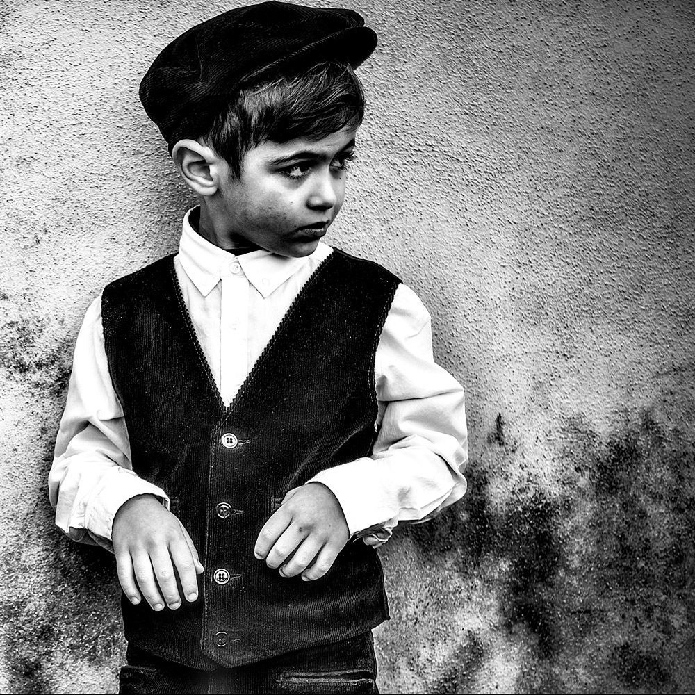 Bimbo con coppola profilo